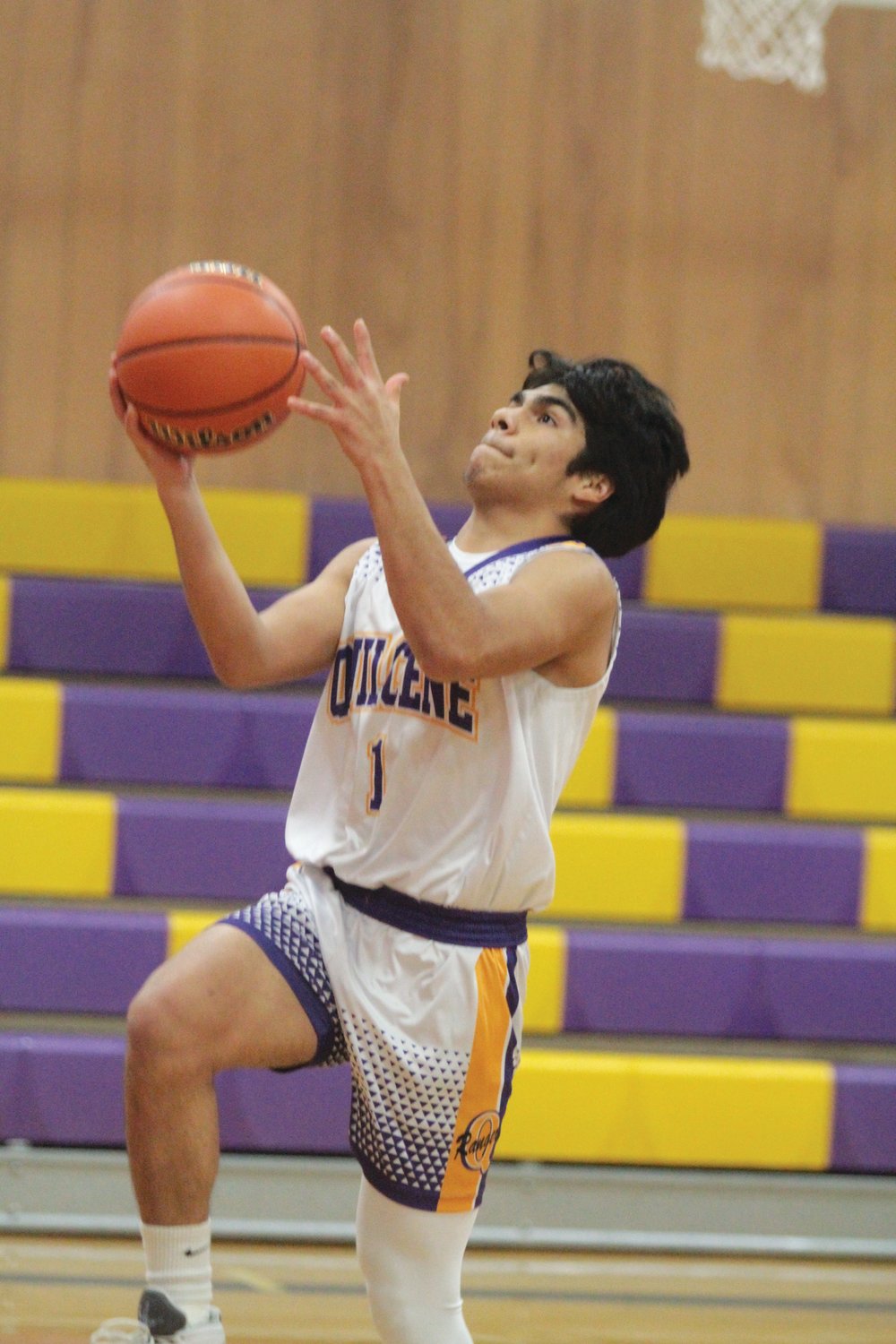 Andrew Perez-Lopez goes coast-to-coast for an uncontested layup for Quilcene in action against the Lions.